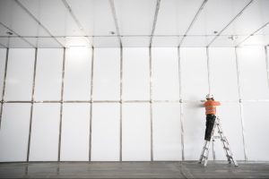 Image of a worker on a ladder